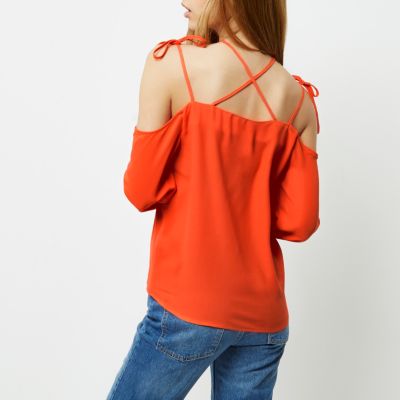 Red crossover strappy cold shoulder top